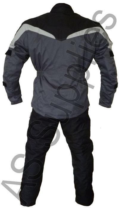 Motorcycle jacket and pants set on a white background